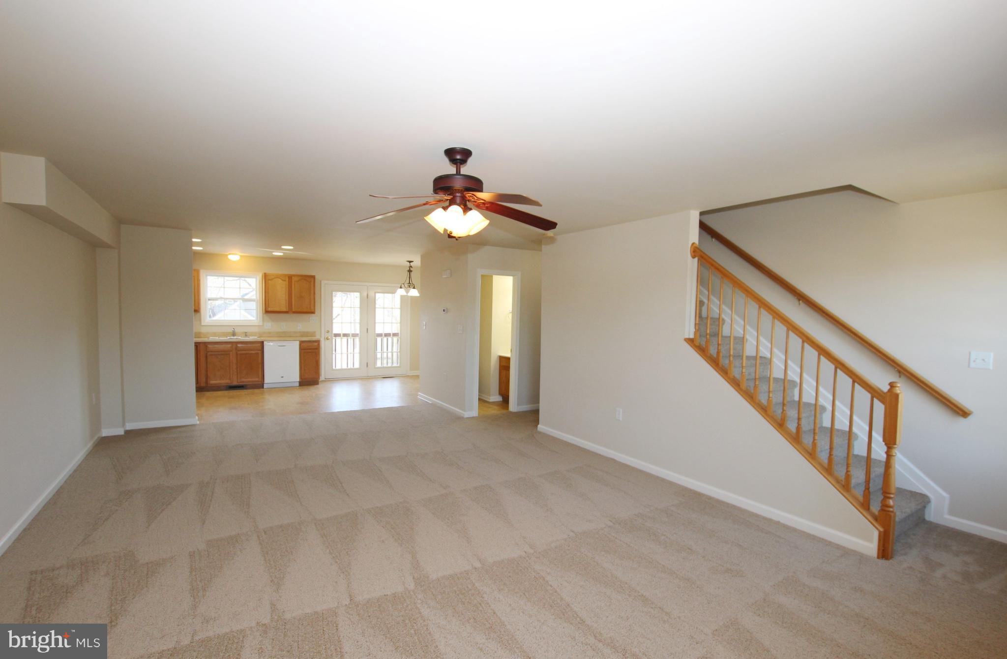 312 East 5th Avenue Ranson, WV 25438 - Photo 7 of 18 a view of a livingroom with a fireplace