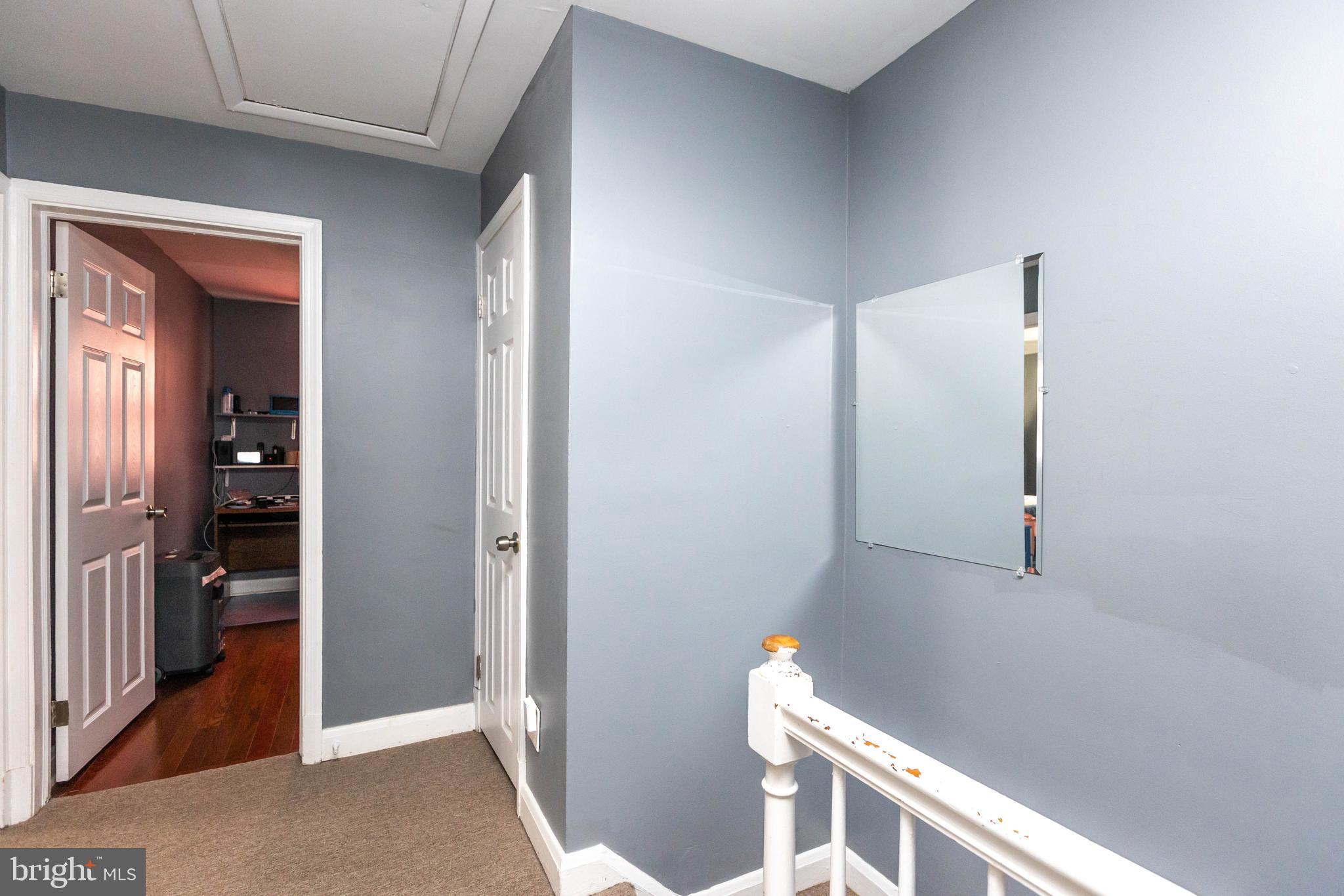 1911 Ramblewood Road Baltimore, MD 21239 - Photo 12 of 29 2nd level hall with linen closet storage