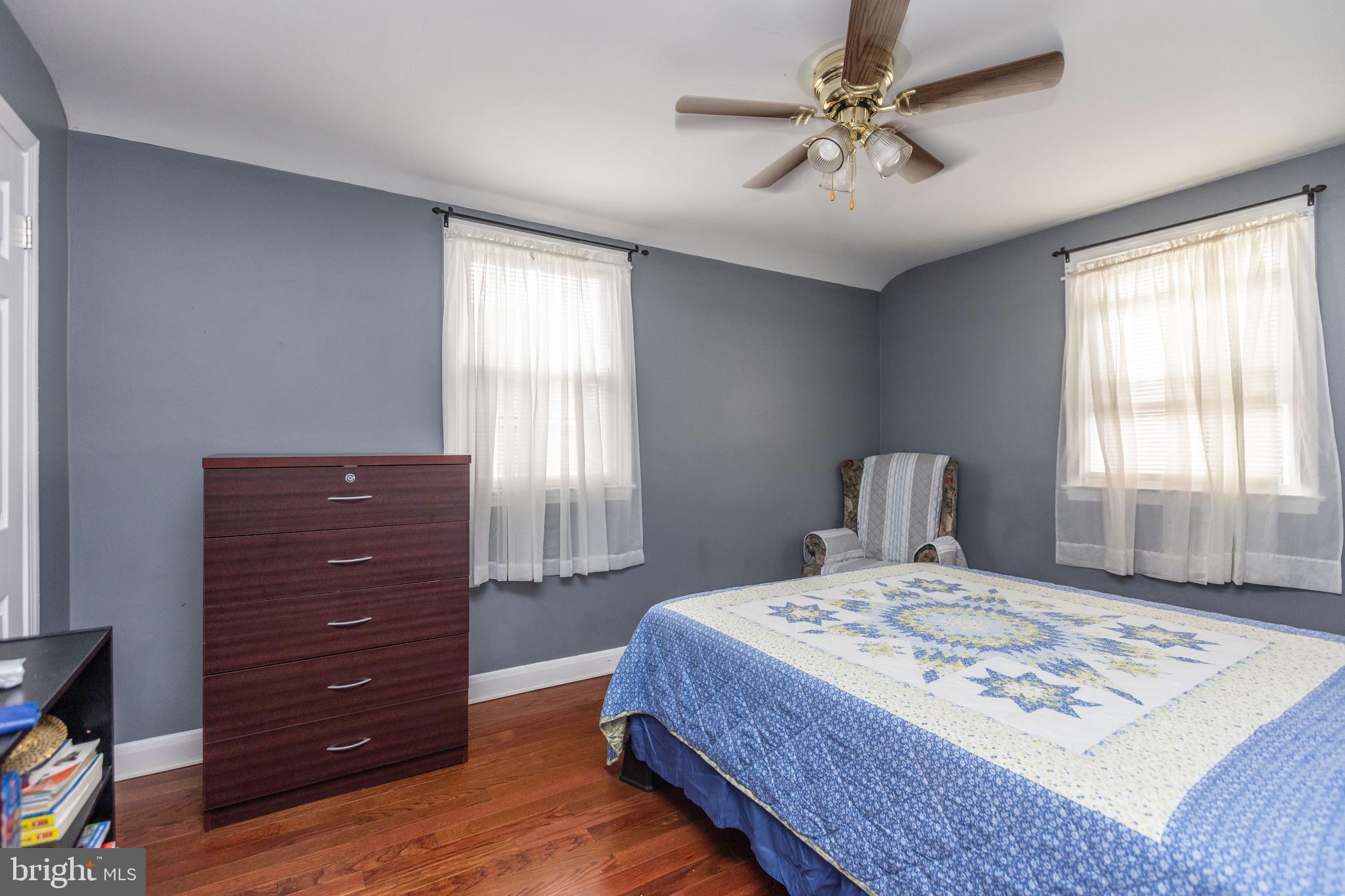 1911 Ramblewood Road Baltimore, MD 21239 - Photo 13 of 29 Bedroom #2 with wood floors and ceiling fan.