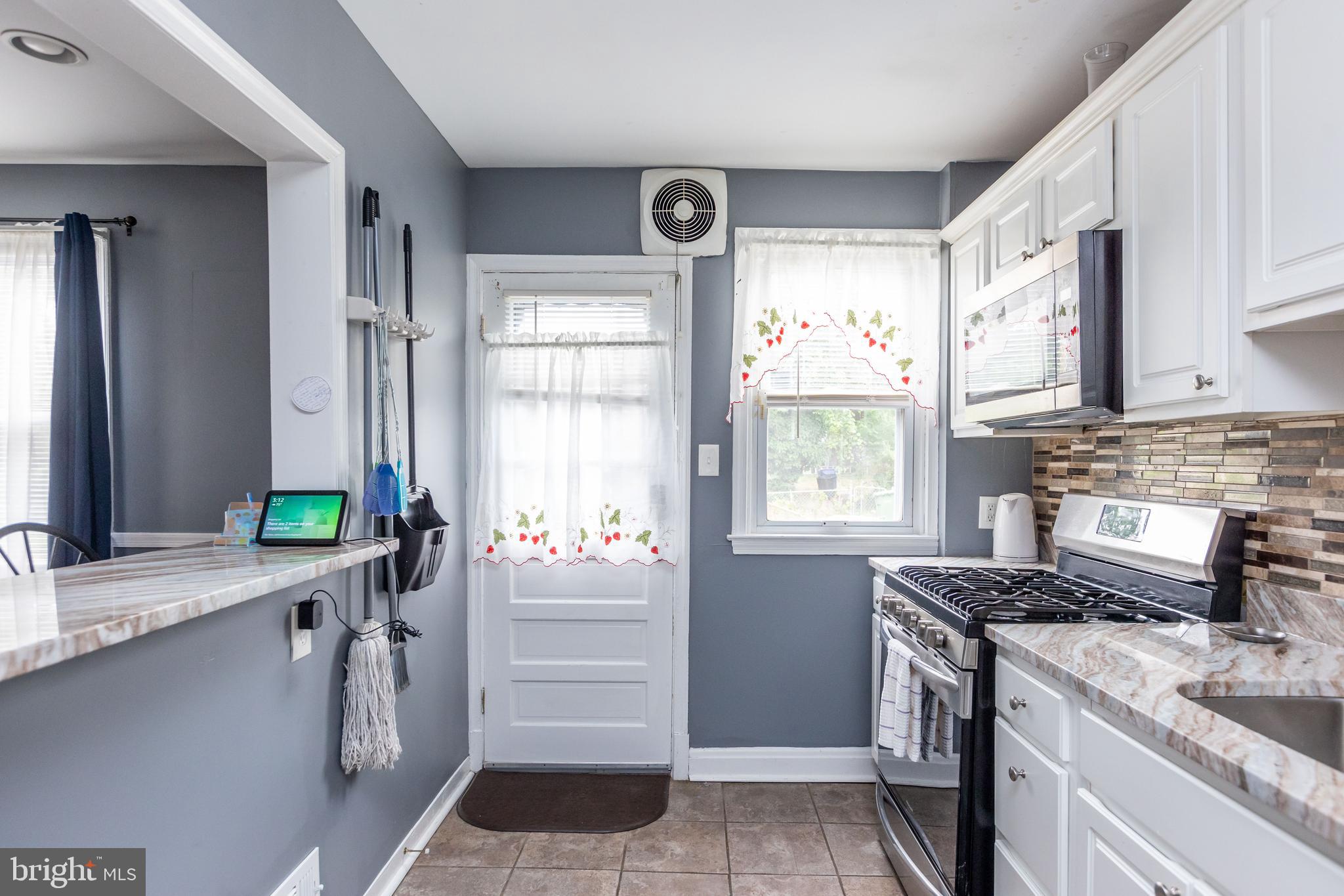 1911 Ramblewood Road Baltimore, MD 21239 - Photo 9 of 29 Granite counters in the kitchen