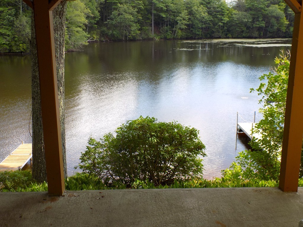 101 Sandy Beach Road Holland, MA 01521 - Photo 5 of 23 an aerial view of a house with a yard and a garden view