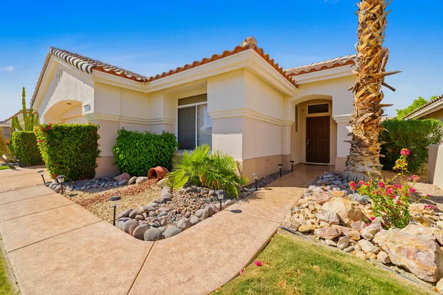 a front view of house with yard