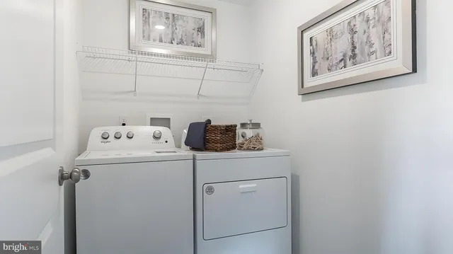 a view of a balcony with furniture and shower