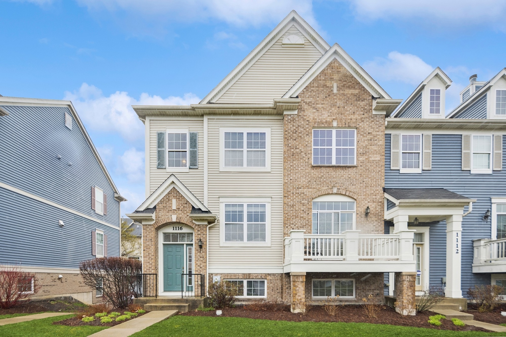 1116 Bartholdi Court Carol Stream, IL 60188 - Photo 1 of 21 a front view of residential houses with yard