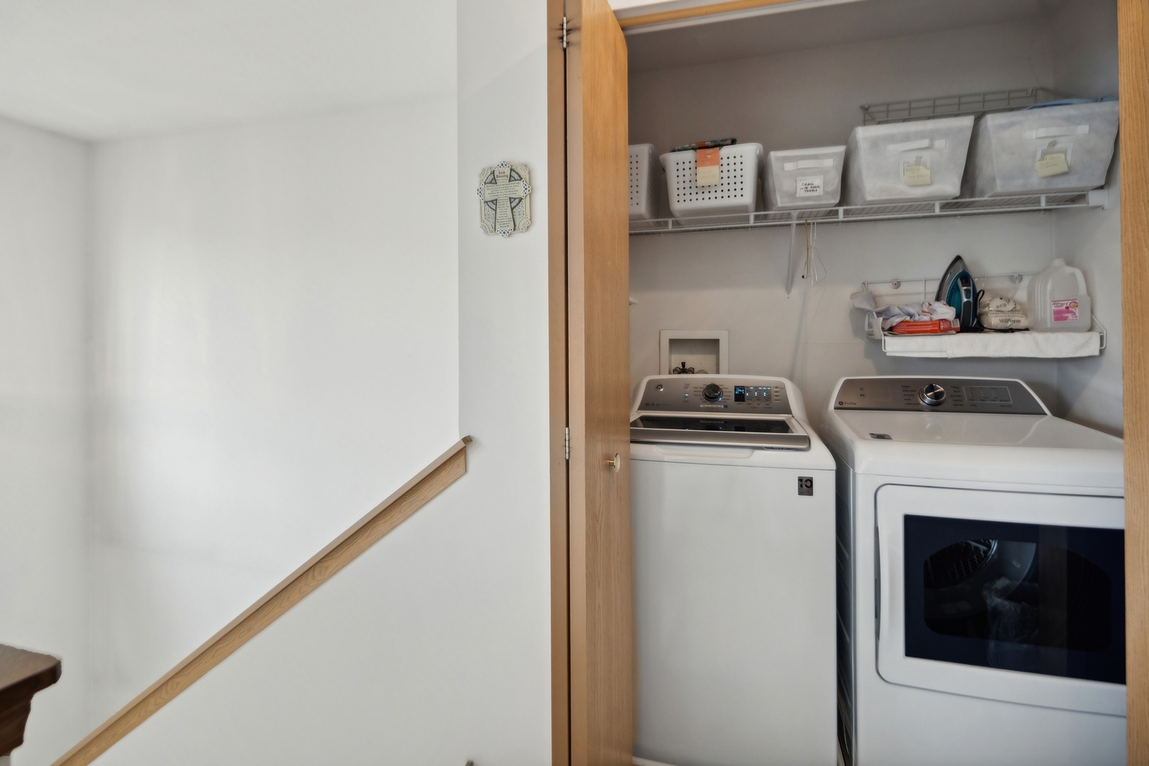 1116 Bartholdi Court Carol Stream, IL 60188 - Photo 16 of 21 a view of washer and dryer with kitchen in the background
