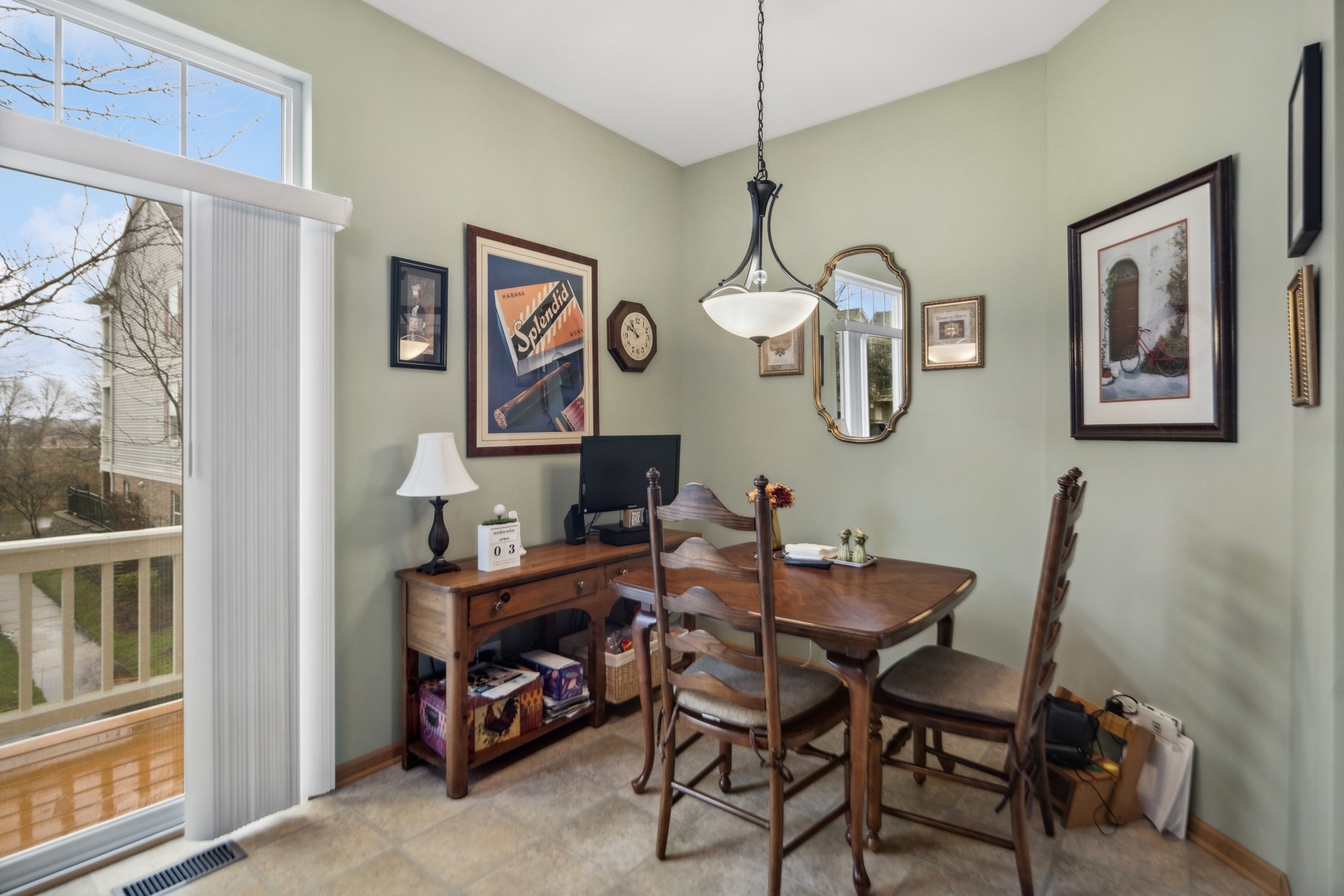 1116 Bartholdi Court Carol Stream, IL 60188 - Photo 8 of 21 a room with a table and a chair