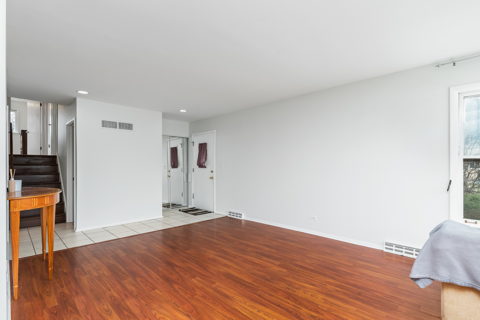 119 Mulberry Road Deerfield, IL 60015 - Photo 8 of 20 a view of empty room with wooden floor