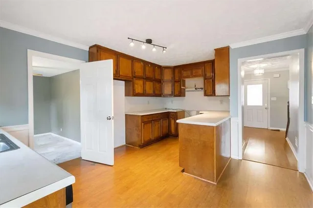 a bathroom with a tub and a sink