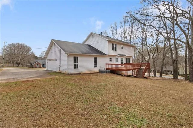 a house with trees in front of it