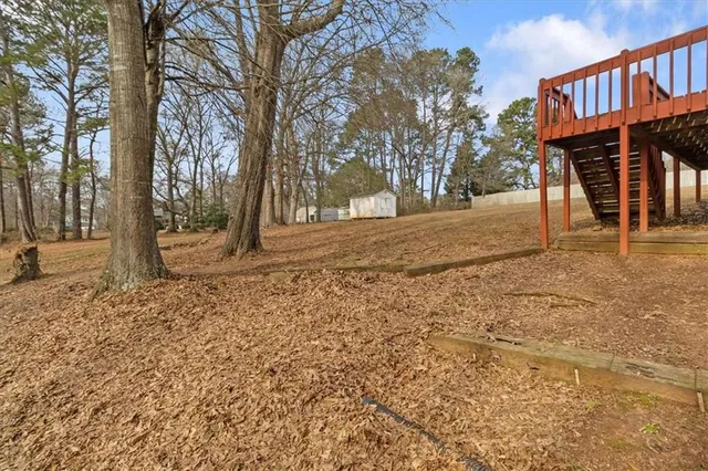 a view of a street with a building in the background