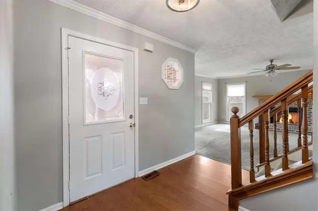 a view of a hallway with entryway