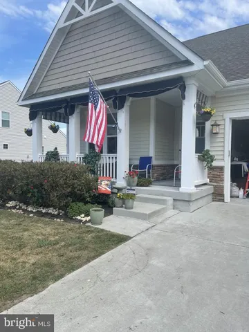 a view of a house with entertaining space