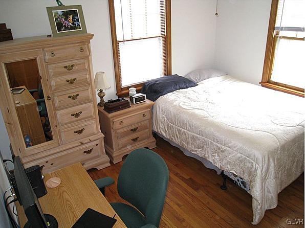 8368 Airport Road Bath, PA 18014 - Photo 5 of 10 a bedroom with a bed and a window
