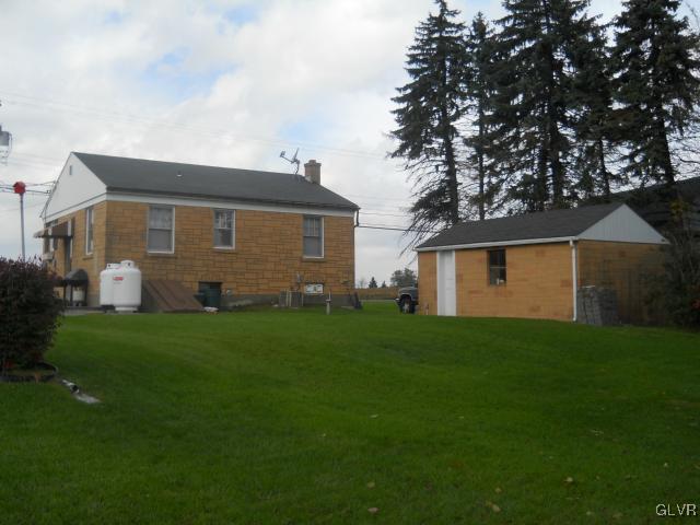 8368 Airport Road Bath, PA 18014 - Photo 8 of 10 a front view of house with yard and green space