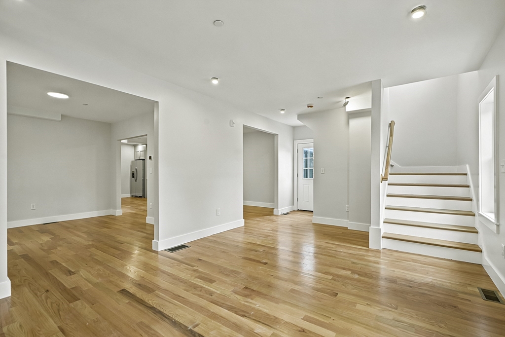 4 Mayhew Street Framingham, MA 01702 - Photo 9 of 42 a view of wooden floor and windows in a room