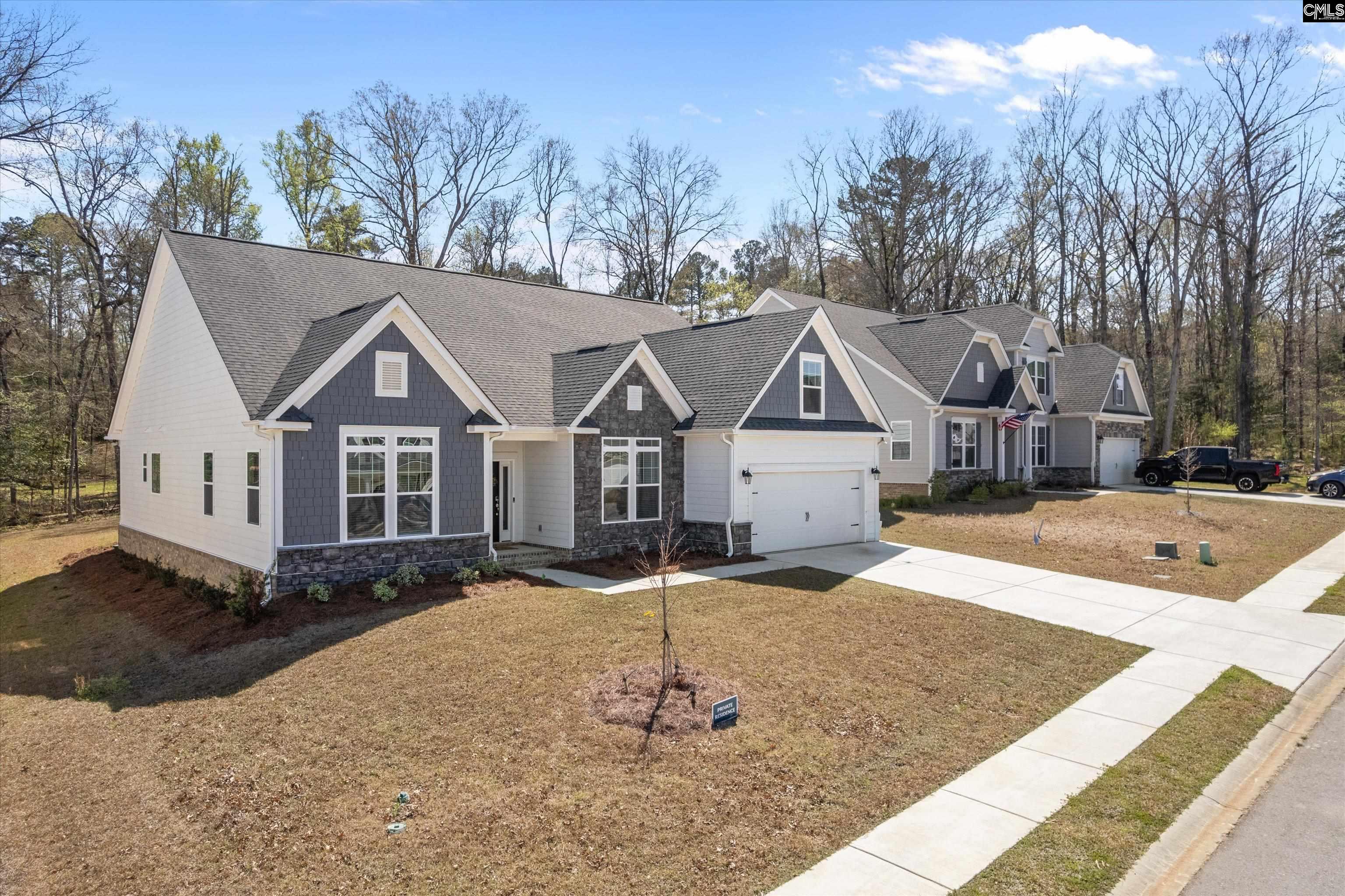 558 Wild Ginger Loop Irmo, SC 29063 - Photo 2 of 42 a front view of a house with a yard