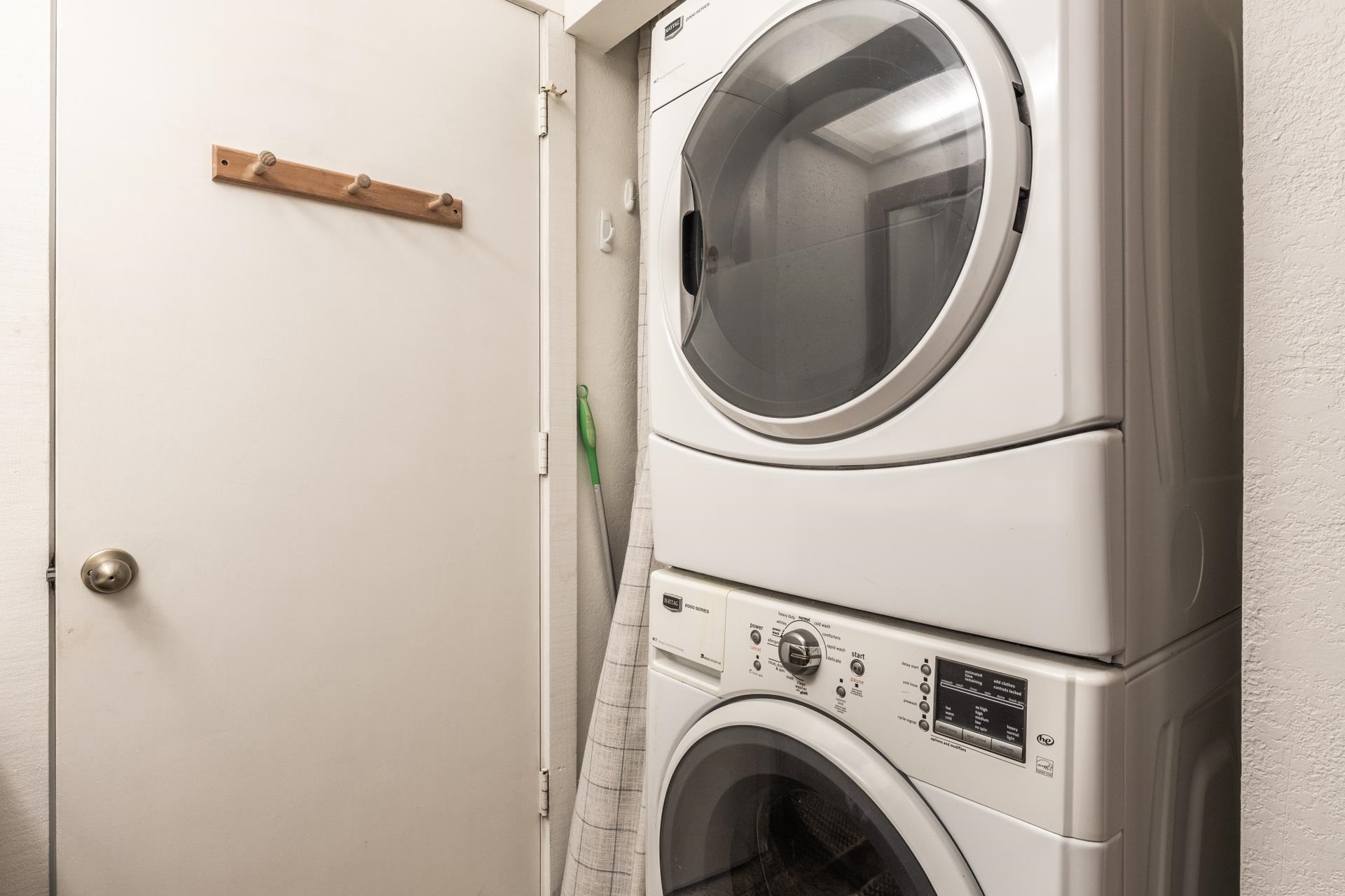 402 Snowcreek Road, Unit 402 Mammoth Lakes, CA 93546 - Photo 22 of 47 a close view of a utility room with dryer and washer
