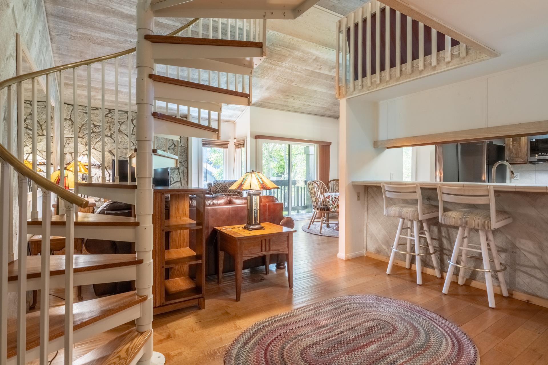 402 Snowcreek Road, Unit 402 Mammoth Lakes, CA 93546 - Photo 7 of 47 a view of a livingroom with furniture and window