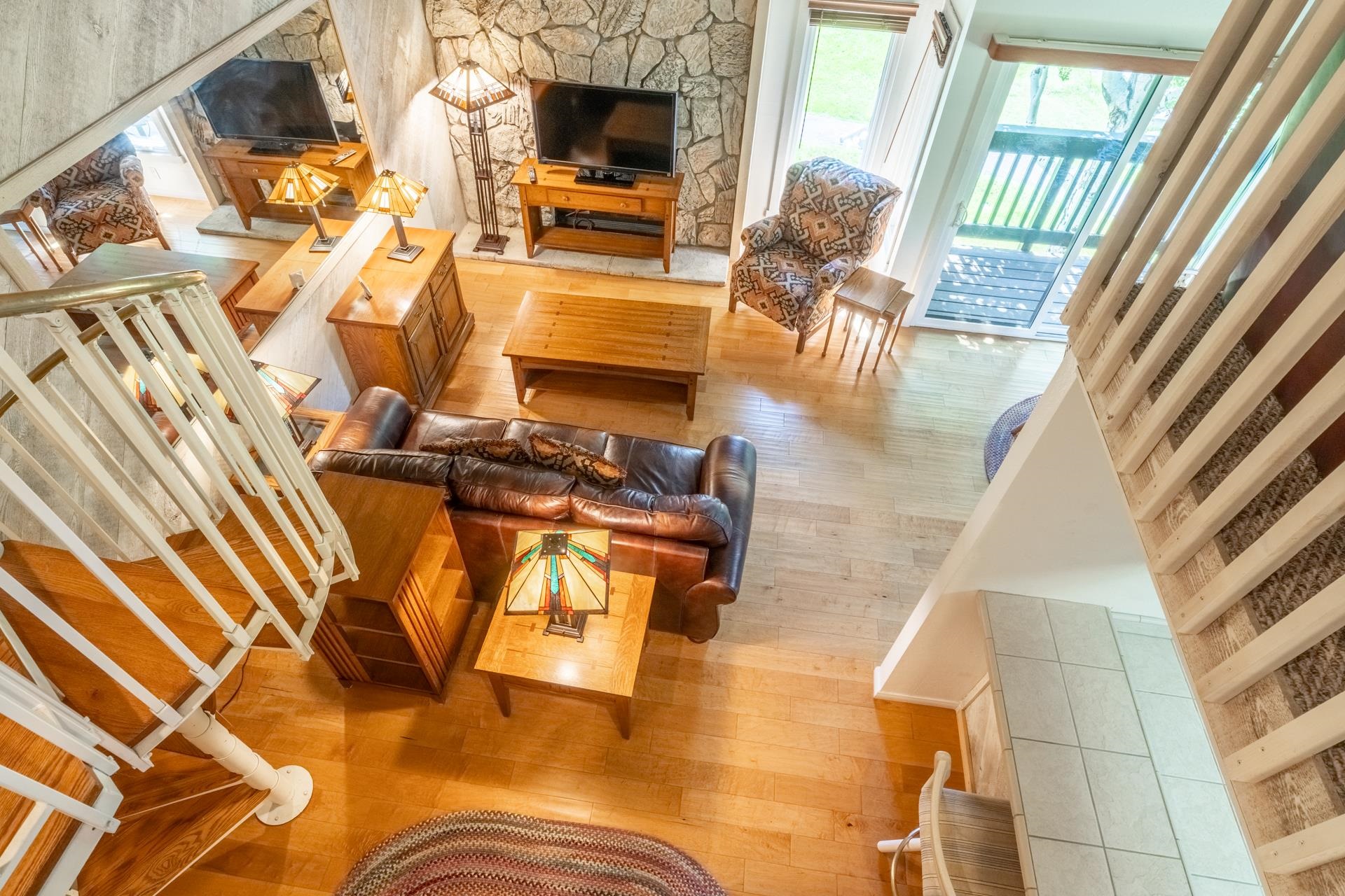 402 Snowcreek Road, Unit 402 Mammoth Lakes, CA 93546 - Photo 9 of 47 a living room with furniture and a flat screen tv