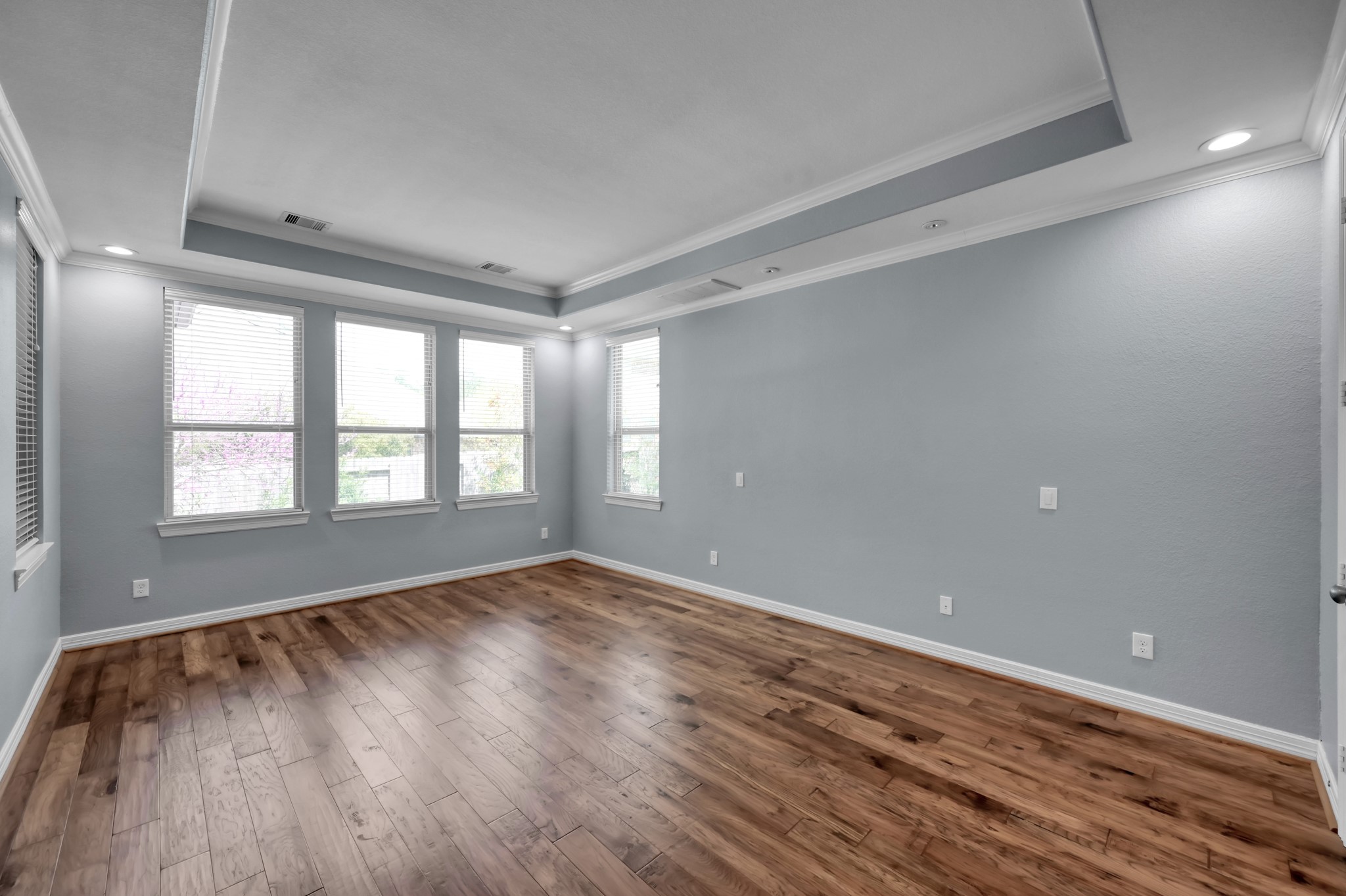 23219 Belted Kingfisher Trail Spring, TX 77389 - Photo 15 of 43 wooden floor in an empty room with a window