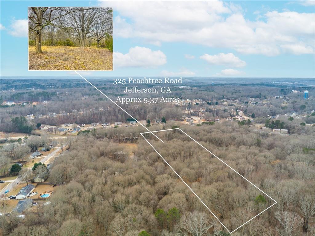 325 Peachtree Road Jefferson, GA 30549 - Photo 2 of 10 a view of a yard