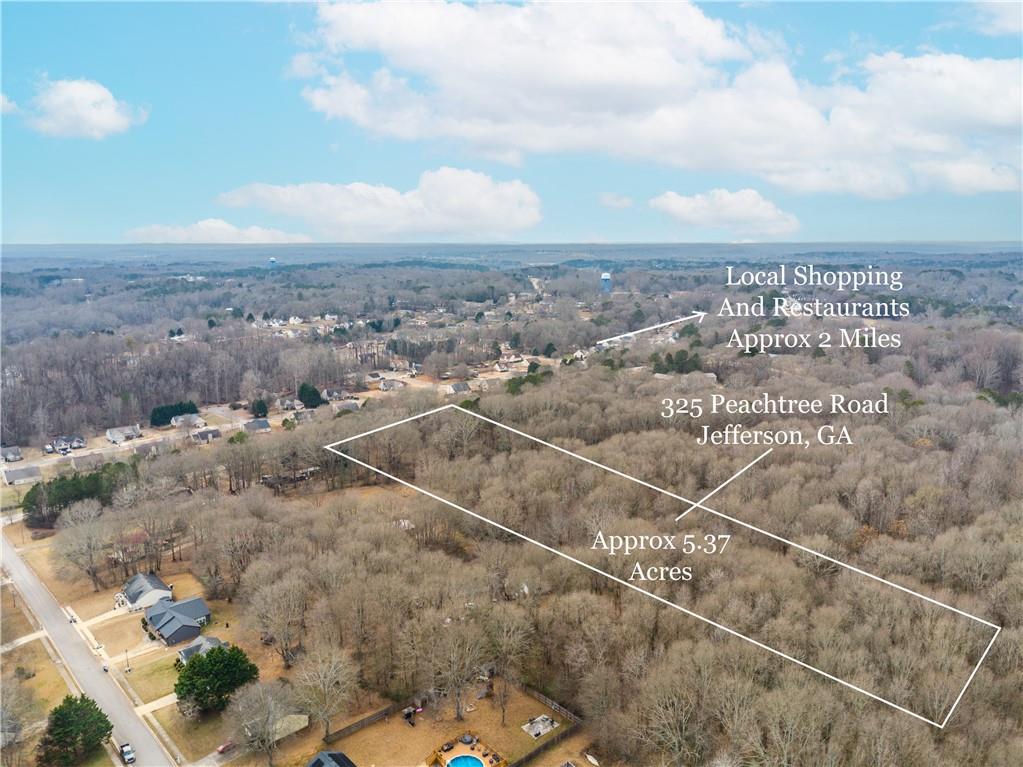 325 Peachtree Road Jefferson, GA 30549 - Photo 6 of 10 an aerial view of a residential houses