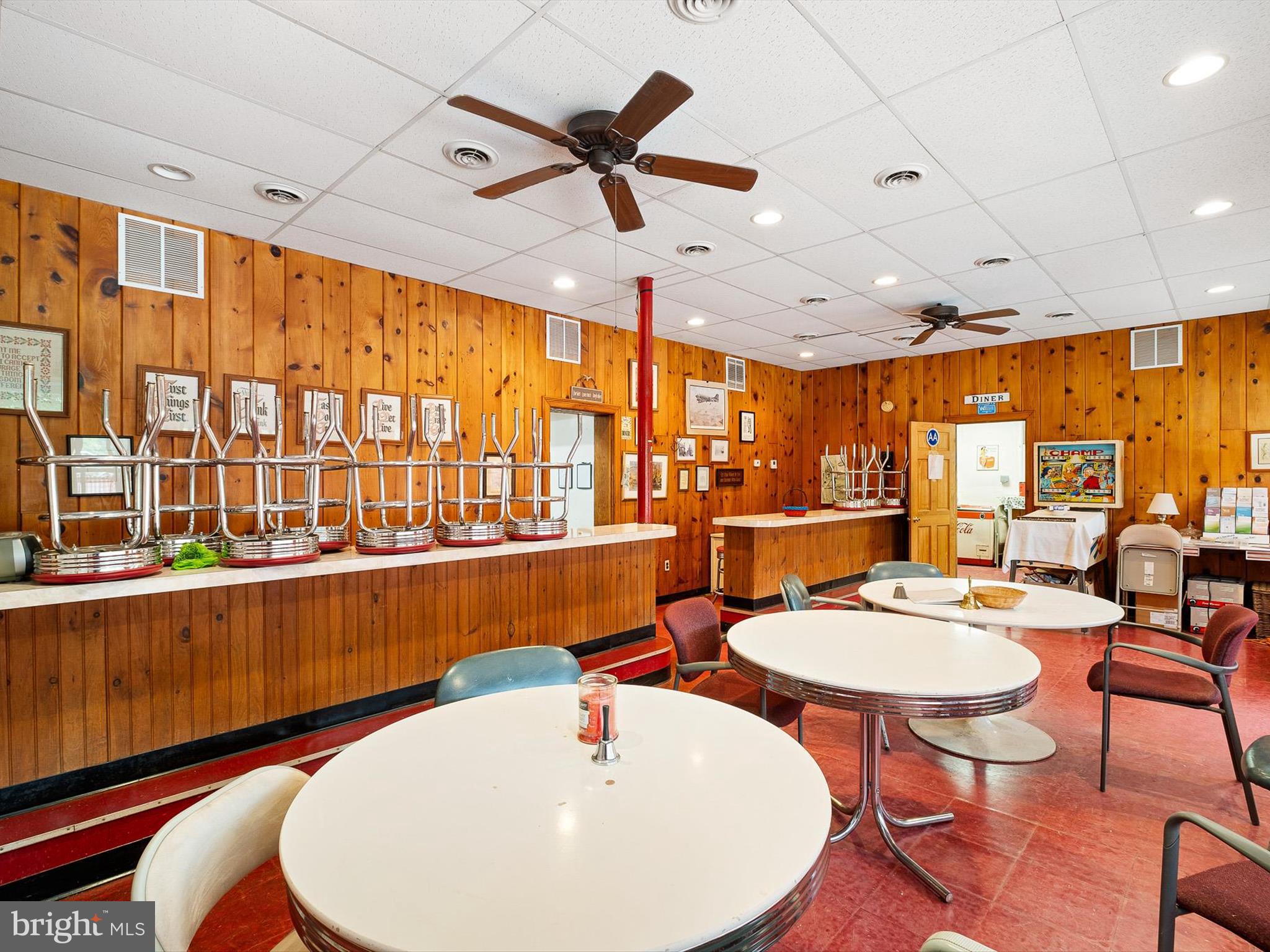 2913 Creek Road Hockessin, DE 19707 - Photo 13 of 39 a dining room with large window a table and chairs