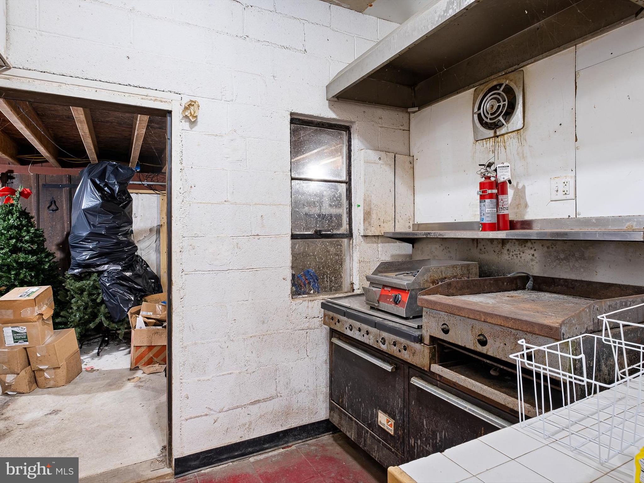 2913 Creek Road Hockessin, DE 19707 - Photo 18 of 39 a room with storage and utility