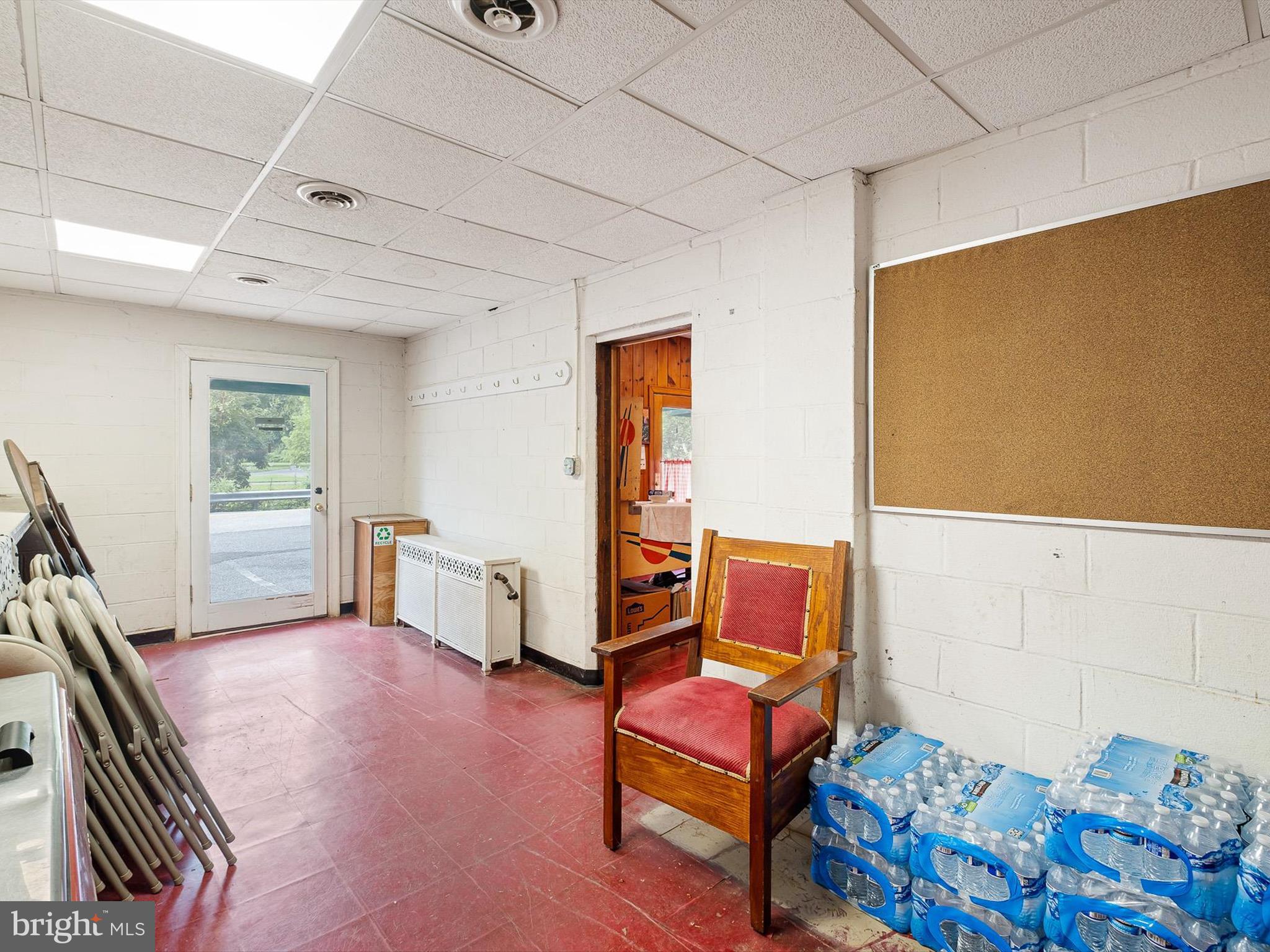 2913 Creek Road Hockessin, DE 19707 - Photo 22 of 39 a bedroom with furniture and a window