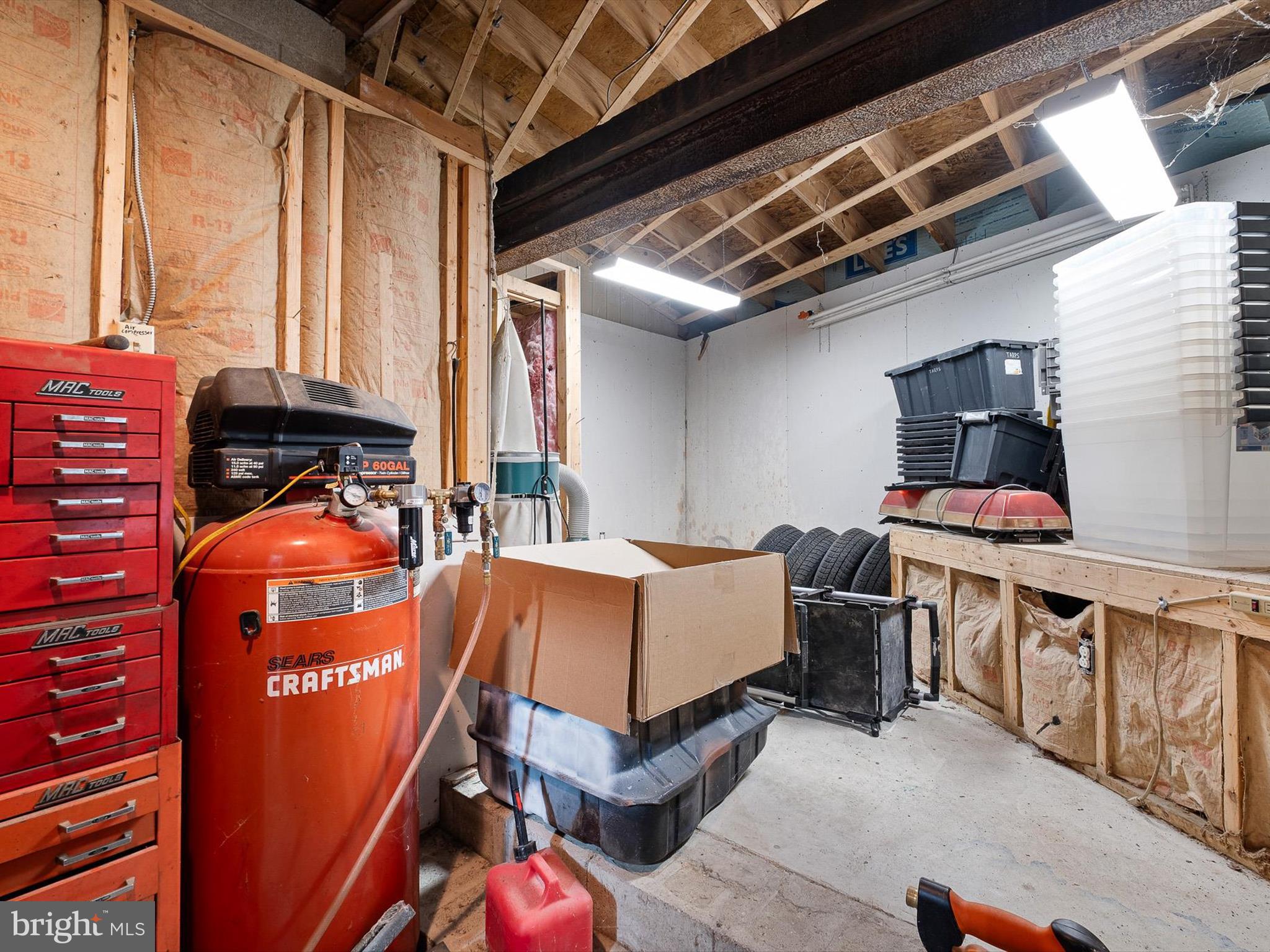 2913 Creek Road Hockessin, DE 19707 - Photo 24 of 39 a room with furniture and a window