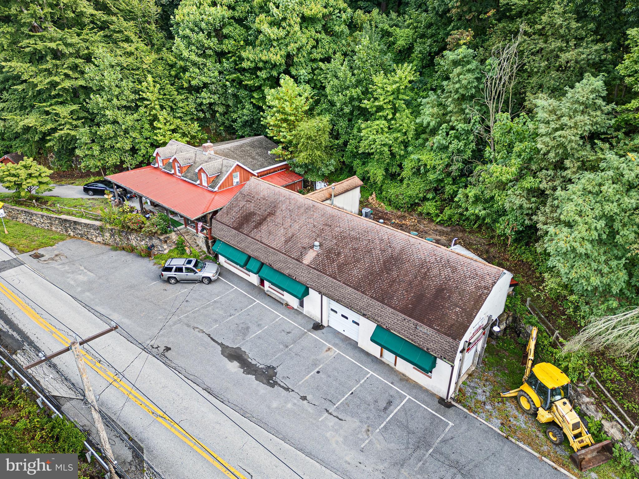 2913 Creek Road Hockessin, DE 19707 - Photo 3 of 39 a view of a yard with an outdoor space