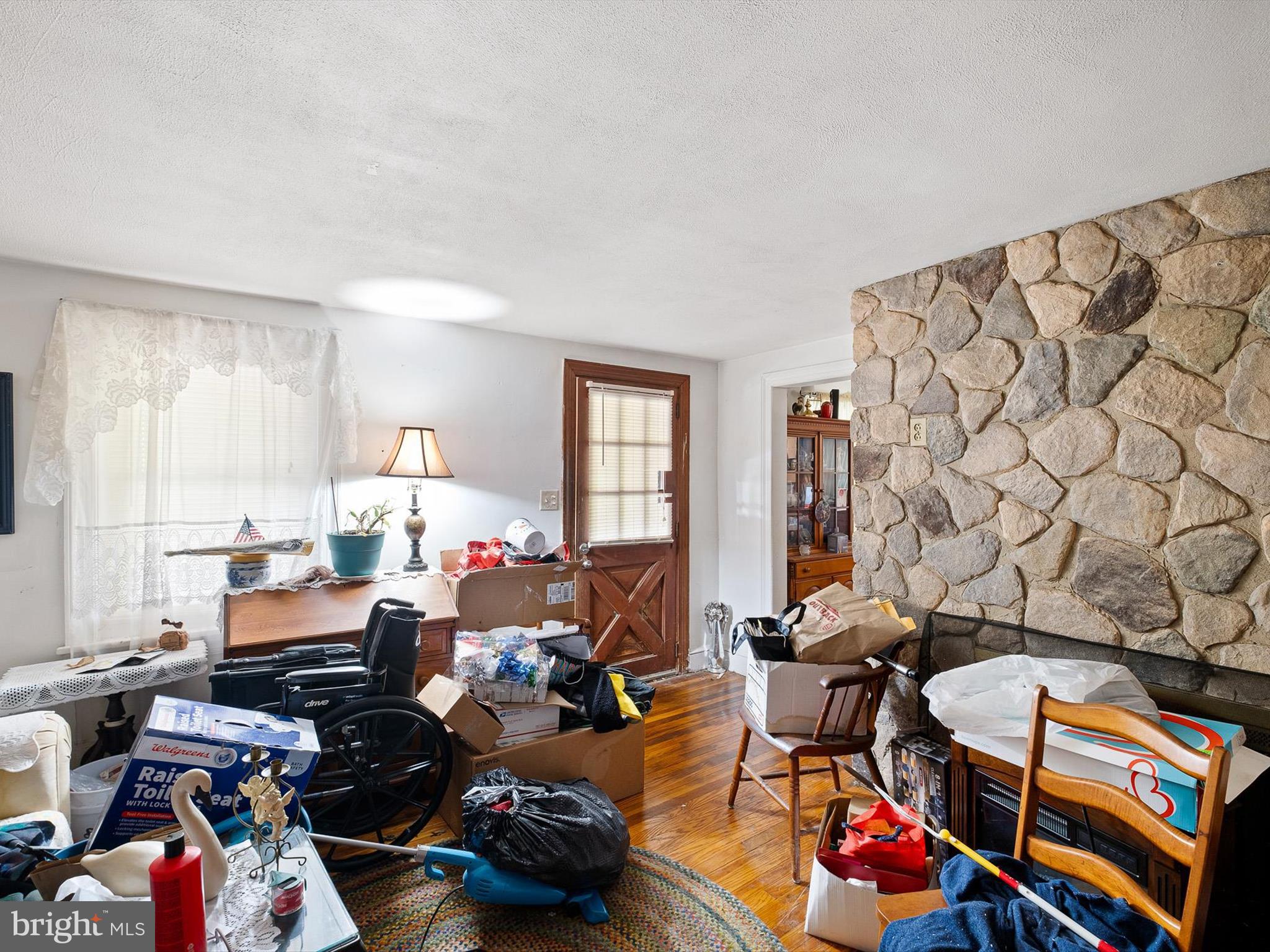 2913 Creek Road Hockessin, DE 19707 - Photo 36 of 39 a bed room with furniture and a window