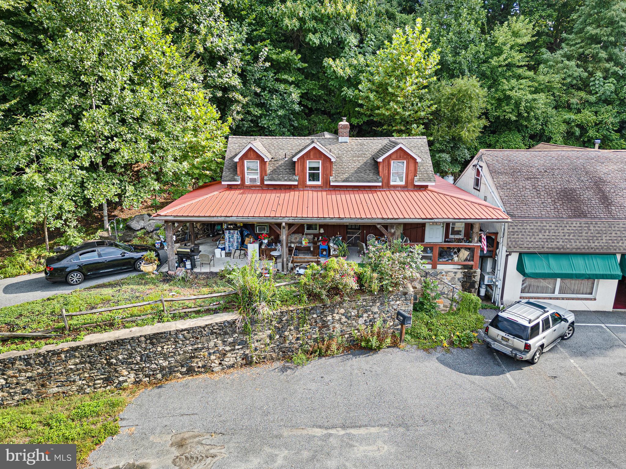 2913 Creek Road Hockessin, DE 19707 - Photo 5 of 39 a front view of a house with garden