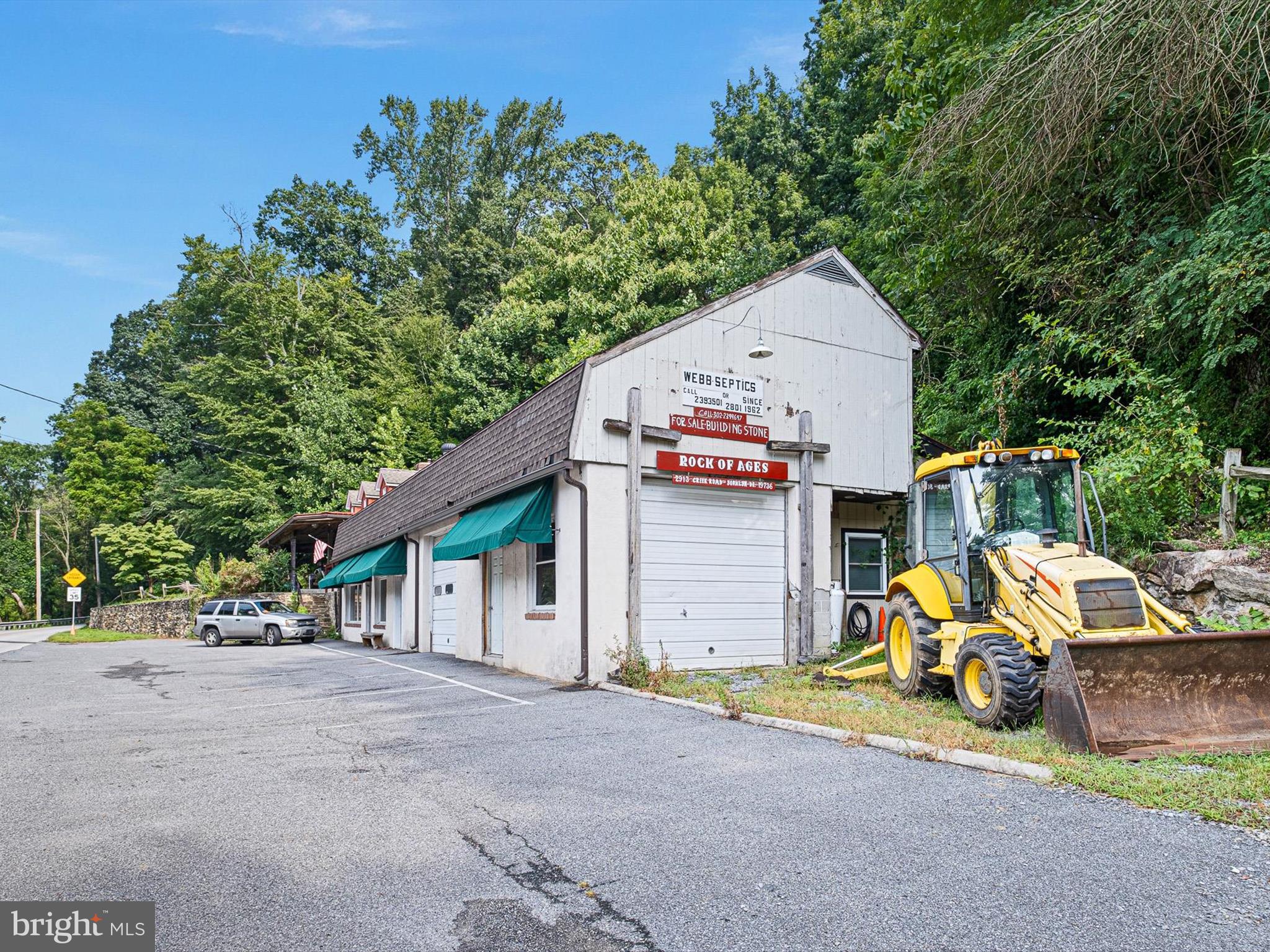 2913 Creek Road Hockessin, DE 19707 - Photo 8 of 39 a view of a house with backyard and a area