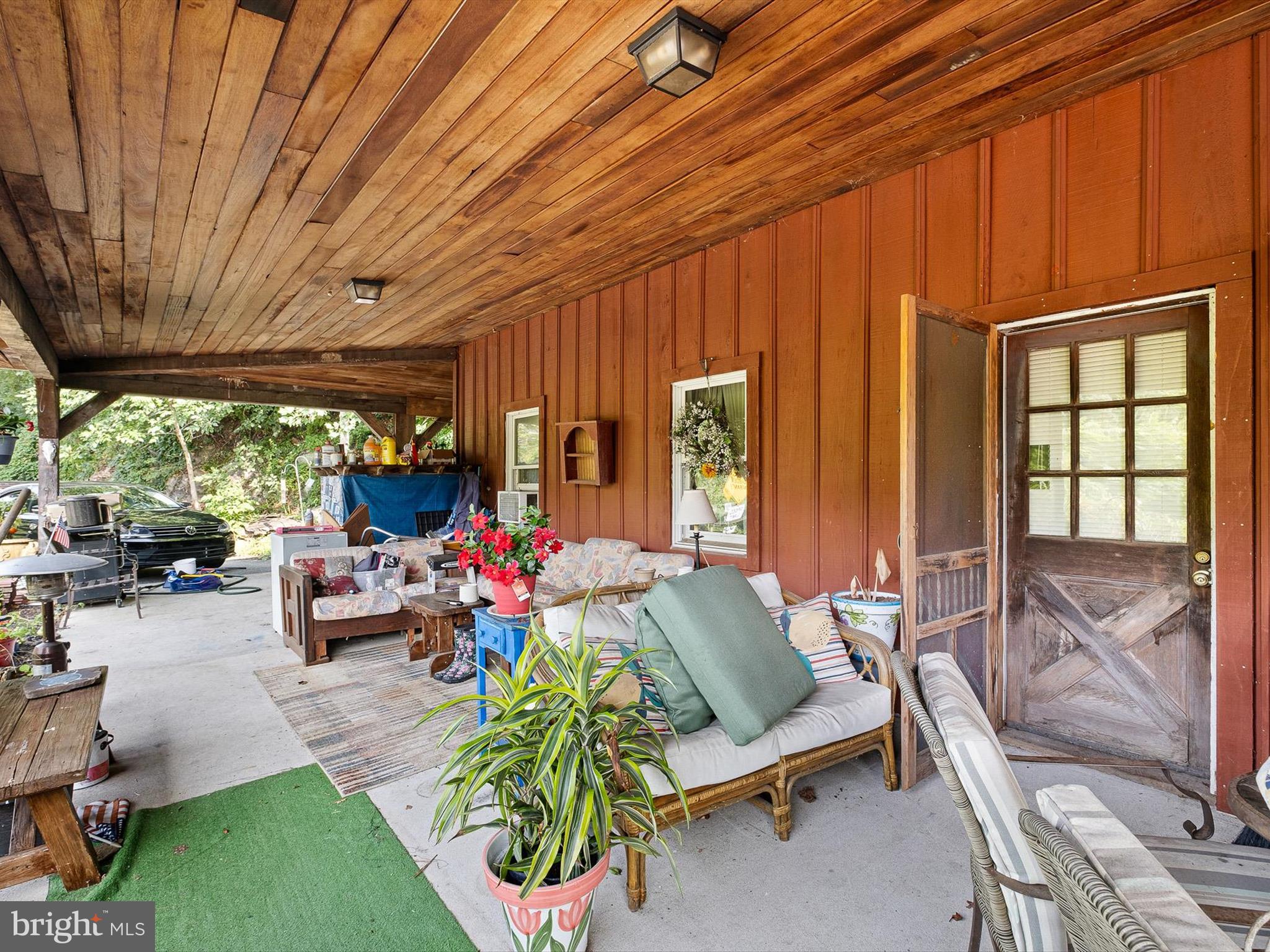 2913 Creek Road Hockessin, DE 19707 - Photo 10 of 39 a view of a porch with furniture