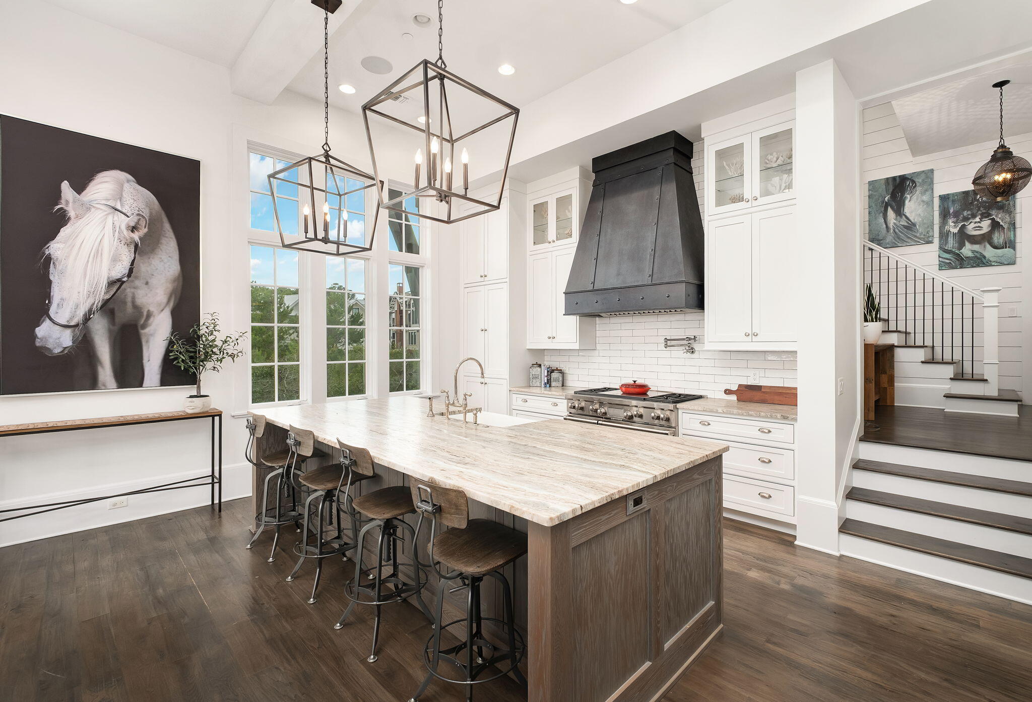 28 Bluff Lane Santa Rosa Beach, FL 32459 - Photo 11 of 24 a kitchen with a table chairs and white cabinets