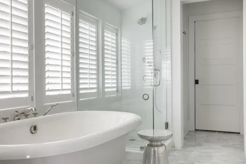 a view of a balcony with wooden floor