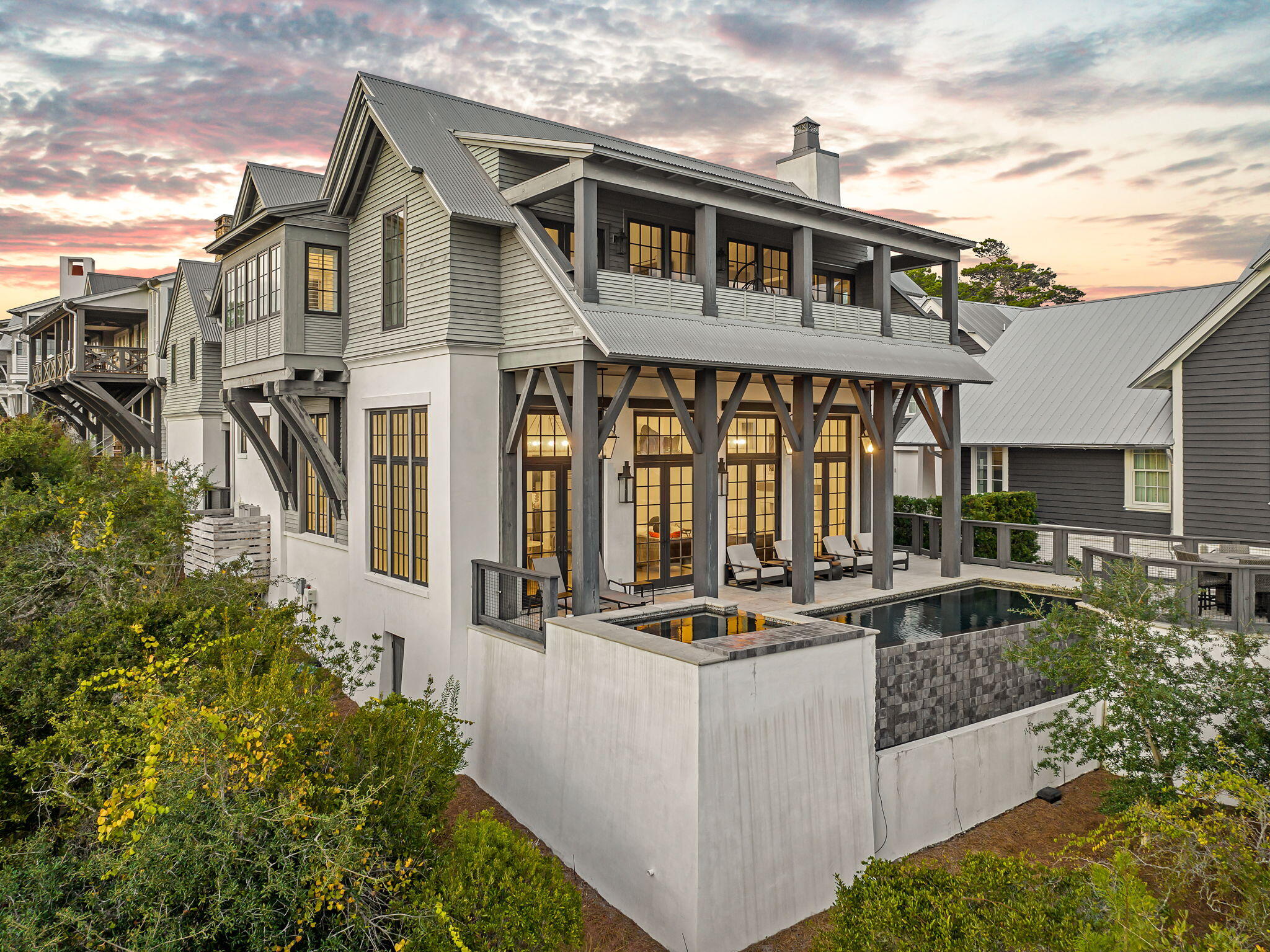 28 Bluff Lane Santa Rosa Beach, FL 32459 - Photo 2 of 24 a front view of a house with porch and furniture