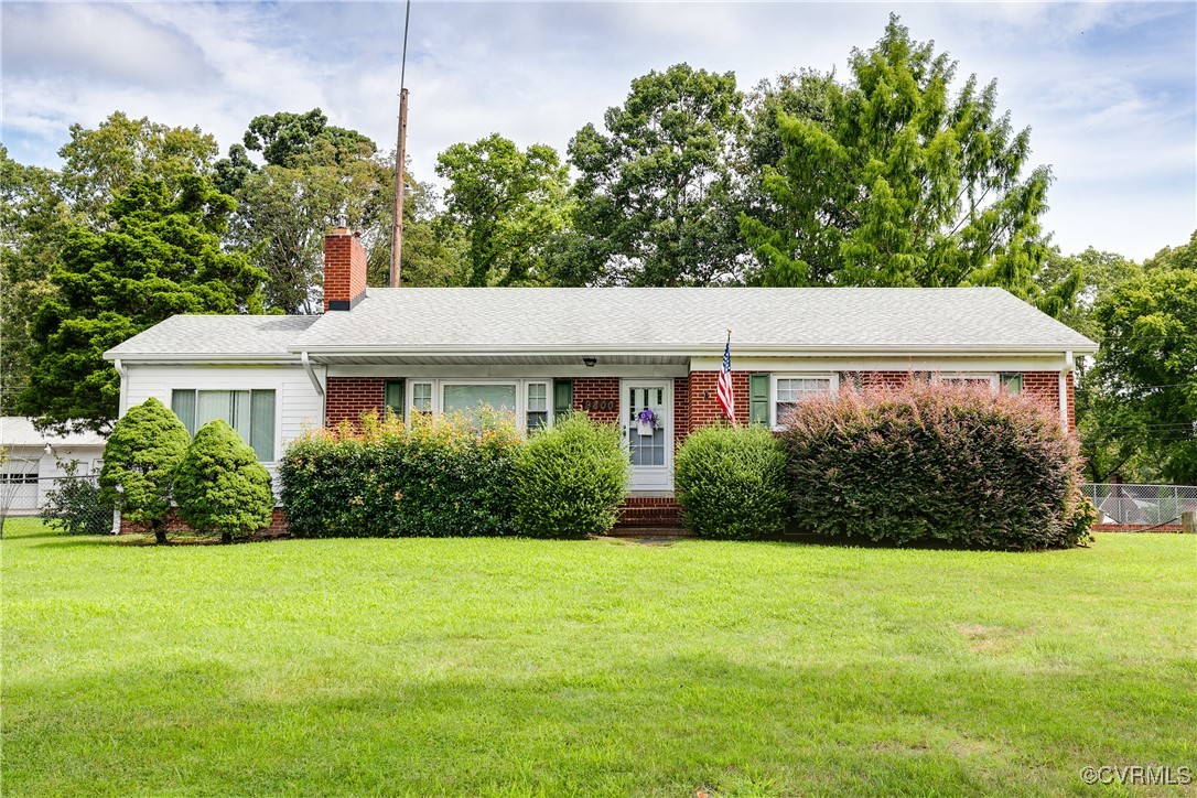 9800-9808 Reams Road North Chesterfield, VA 23236 - Photo 1 of 50 a view of a house with garden and yard