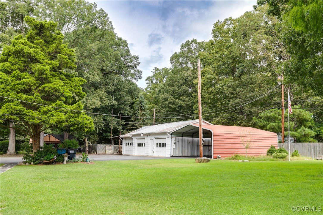 9800-9808 Reams Road North Chesterfield, VA 23236 - Photo 14 of 50 a front view of a house with a yard