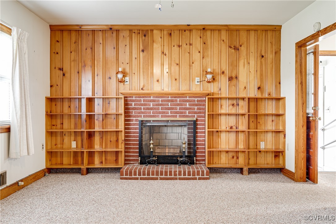 9800-9808 Reams Road North Chesterfield, VA 23236 - Photo 18 of 50 an empty room with a fireplace cabinet and window