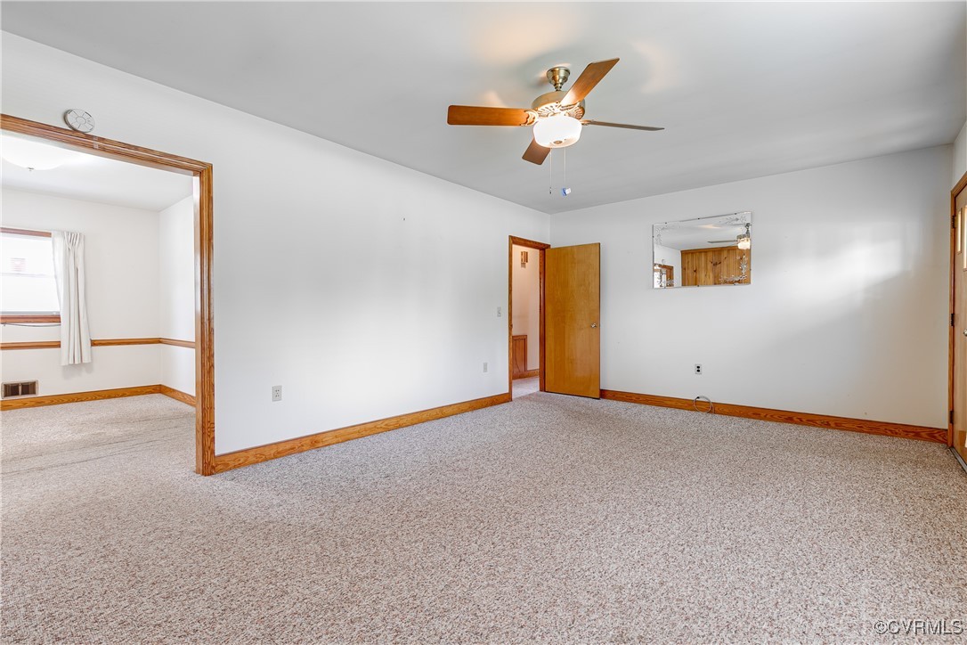 9800-9808 Reams Road North Chesterfield, VA 23236 - Photo 20 of 50 a view of an empty room with a window