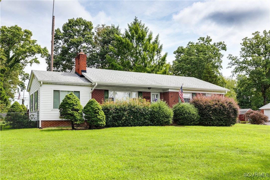 9800-9808 Reams Road North Chesterfield, VA 23236 - Photo 3 of 50 a view of a house with garden and yard