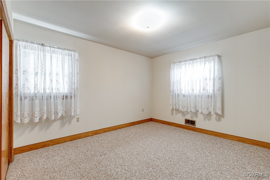 9800-9808 Reams Road North Chesterfield, VA 23236 - Photo 33 of 50 an empty room with a window