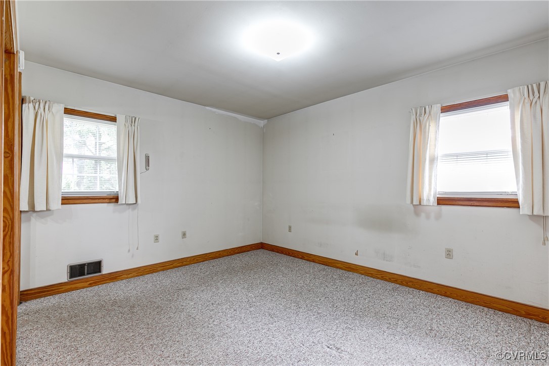 9800-9808 Reams Road North Chesterfield, VA 23236 - Photo 35 of 50 an empty room with a window