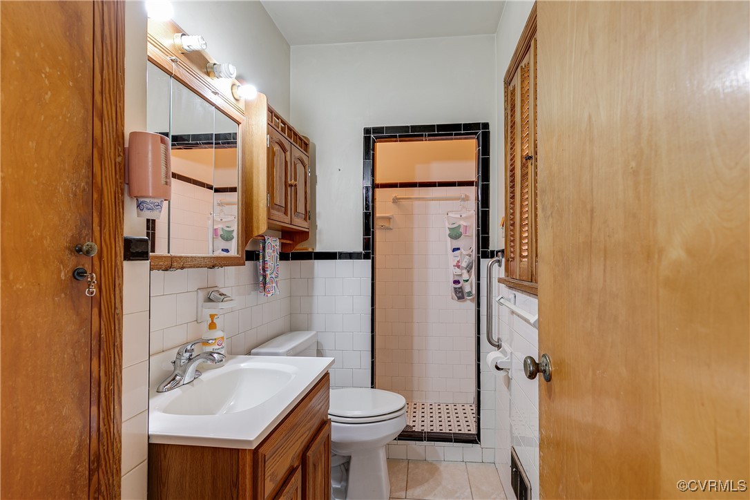 9800-9808 Reams Road North Chesterfield, VA 23236 - Photo 37 of 50 a bathroom with a sink toilet and shower