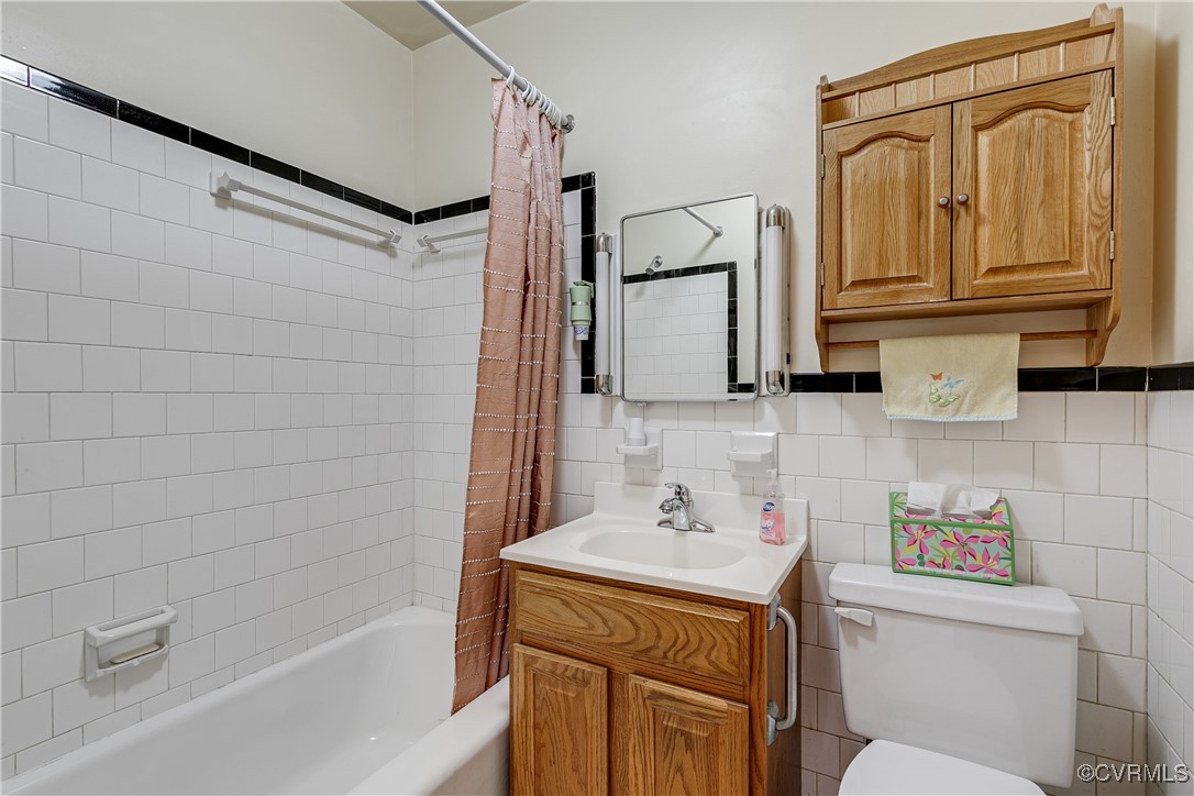 9800-9808 Reams Road North Chesterfield, VA 23236 - Photo 39 of 50 a bathroom with a sink a toilet and shower