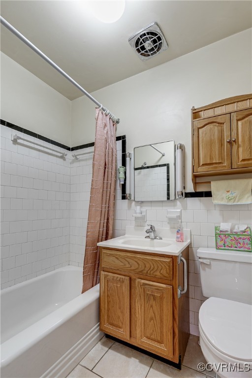 9800-9808 Reams Road North Chesterfield, VA 23236 - Photo 40 of 50 a bathroom with a sink a toilet a mirror and shower
