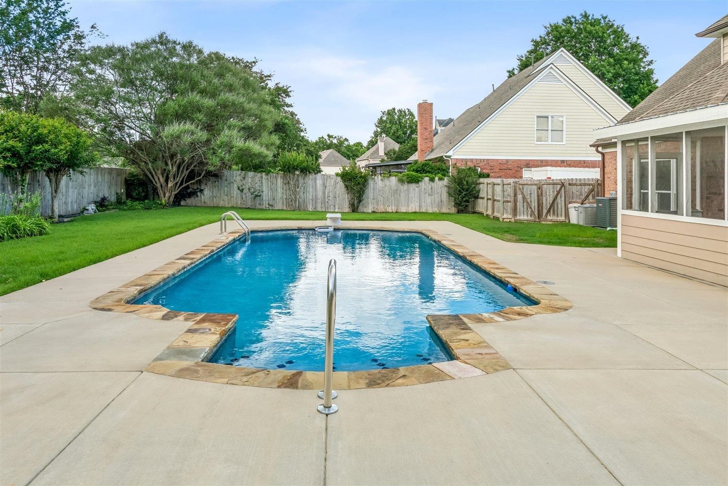 1489 John Ridge Drive Collierville, TN 38017 - Photo 37 of 39 a view of a house with swimming pool