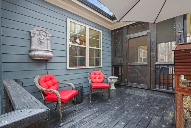 a bathroom with a toilet a sink and a mirror